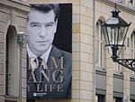 Плакат, на якім выяўлены Адам Ланг.