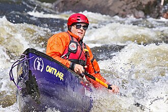 Whitewater canoeist Marty Plante on Narrows Rapids on the Hudson River Gorge, New York State, USA