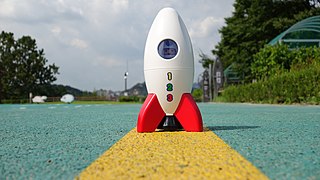 Playmobil rocket on road.jpg