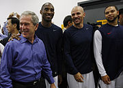 President George W. Bush spends a moment with U.S. Olympic Men's Basketball Team members, from left, Kobe Bryant, Jason Kidd and Deron Williams (10 August 2008)