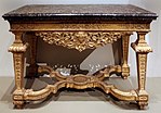 Baroque pier table; 1685–1690; carved, gessoed, and gilded wood, with a marble top; 83.6 × 128.6 × 71.6 cm; Art Institute of Chicago (US)[56]