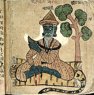 Un poète hindou assis en tailleur.
