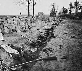 Confederate dead along a stone wall during the Chancellorsville campaign, May 1863. Victorious at Chancellorsville, Southern forces advanced north into Pennsylvania, but were defeated at the three-day battle of Gettysburg, the turning point of the Civil War and the largest battle ever fought in North America. More Americans died in the Civil War (1861-65) than in any other conflict in U.S. history.