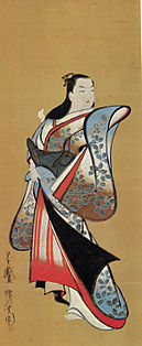 Bức tranh đầy màu sắc của một phụ nữ Nhật Bản ăn mặc trang nhã