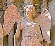 Усмихнатия ангел (1236–45) от Реймска катедрала