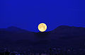 Moon setting against San Gabriel Mountains