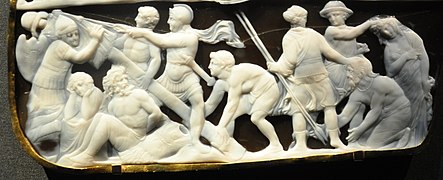 Soldados romanos erigiendo un trophaeum representados en la Gemma Augustea.[17]​