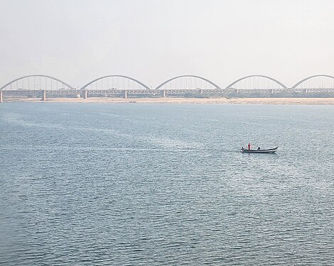 Arch bridge on Godavari river as seen from Rajahmundry in Andhra Pradesh, India.
