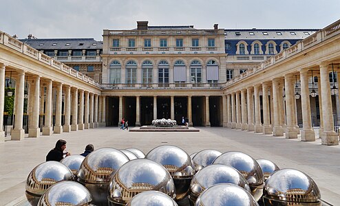 Courtyard of Honor, with the spheres of the Palais-Royal fountain visible.