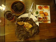マーチャン（肉粽、糯米鶏の派生料理で三角形状を呈する）