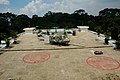 Vị trí hai quả bom mà phi công Nguyễn Thành Trung ném phát nổ, bên cạnh là chiếc UH-1 của tổng thống Nguyễn Văn Thiệu