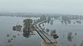 Вид на Демидів з боку мосту на автодороі Р02 через річку Ірпінь після затоплення заплави