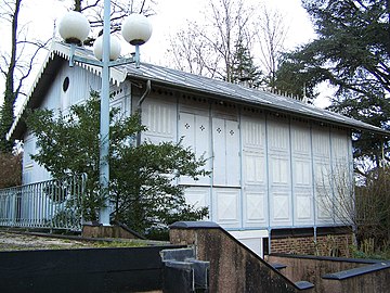 The "Iron House", a prefabricated galvanized steel house designed by Gustave Eiffel, used as a ticket booth in the exposition, now a park shelter in Dampierre