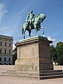 Karl Johan-monumentet foran slottet. Foto: Riabha