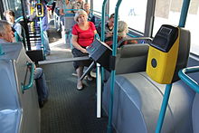 Turnstile and smart card reader in Moscow bus.JPG