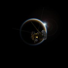 Umělecká představa pohledu na Titan a Slunce