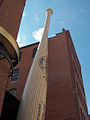 A giant baseball bat decorates the outside of Louisville Slugger Museum & Factory.