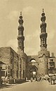 The Fatimid gate of Bab Zuwayla with the twin minarets of the adjoining mosque of Sultan al-Muayyad Shaykh. Herz restored both the gate and the splendid minarets.