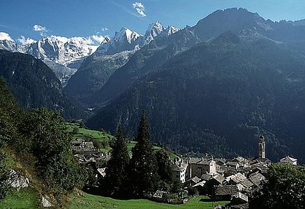 View from above Soglio of the Sciora peaks (left), Piz Cengalo (left centre) and Piz Badile (centre)