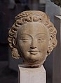 Bodhisattva or devata to earring. Greco-Buddhist Art. Tumshuq to Toqquz-Sarai (Kashgar). 5th cent. Dried mud. Guimet Museum