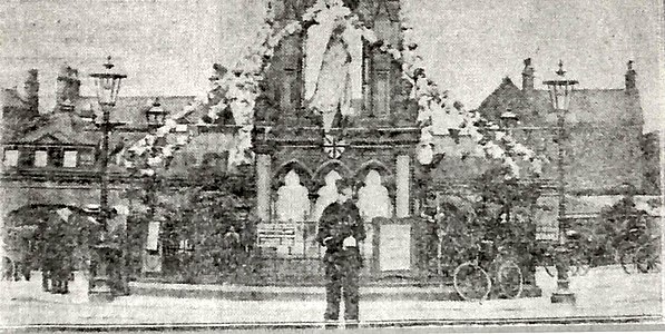 The monument garlanded for the Lord Mayor of London's visit, 1913