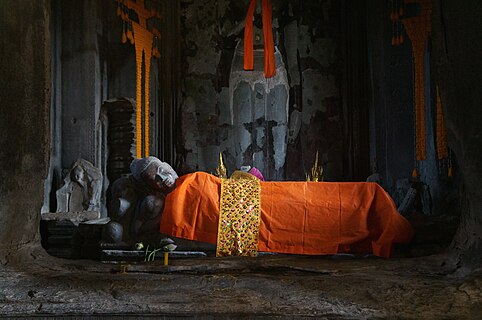 Statue of reclining Buddha in the central Prasat.- Angkor Wat