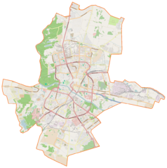 Mapa konturowa Grodna, w centrum znajduje się ikonka zamku z wieżą z opisem „Nowy Zamek w Grodnie”