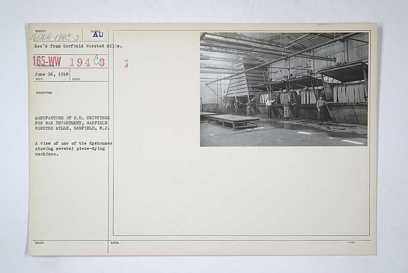 File:Industries of War - Cloth - Shirting - MANUFACTURE OF O.D. SHIRTINGS FOR WAR DEPARTMENT; GARFIELD WORSTED MILLS, GARFIELD, New Jersey. A view of one of the dyehouses showing several piece-dying machines - NARA - 31487164.jpg