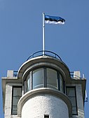 Flag of Estonia on top of Suur Munamagi observation tower, the highest point in Estonia, at 318m above sea level.