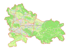 Mapa konturowa gminy miejskiej Lublana, blisko centrum na lewo znajduje się punkt z opisem „Uniwersytet Lublański”
