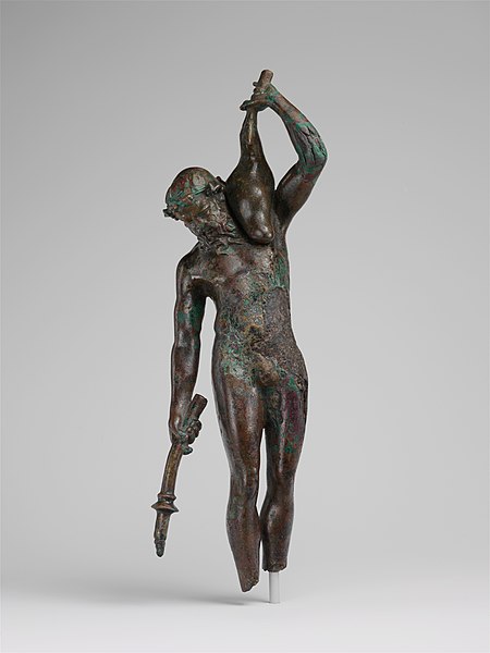 File:Bronze statuette of a satyr with a torch and wineskin MET DP118083.jpg