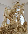 An oblique front view of the Farnese Bull. Note that lighting greatly affects the appearance of the marble.