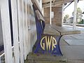 GWR Shirt Button railway bench at St Erth railway station, Cornwall, UK