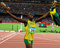 Atletičar iz Jamajke, Usain Bolt slavi pobjedu u utrci na 100 m na XXIX. Olimpijskim igrama u Pekingu.