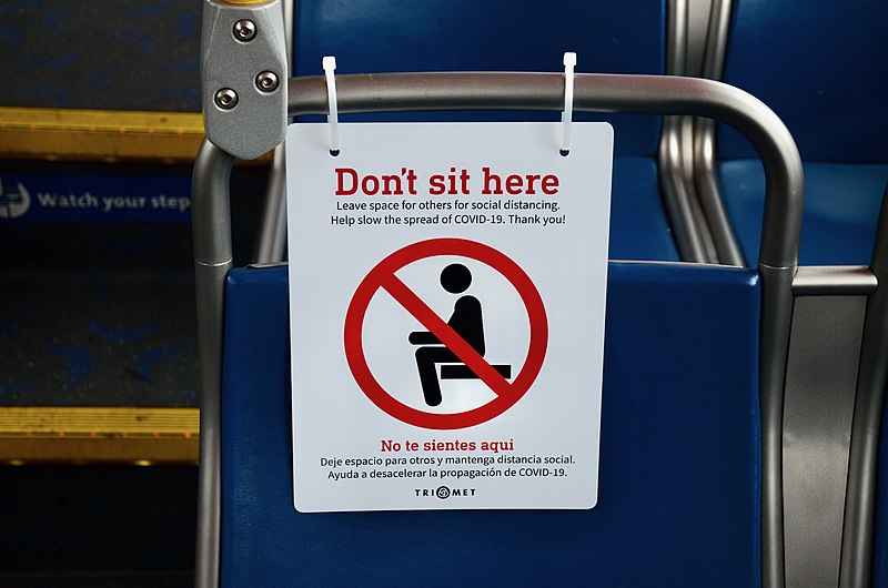 File:"Don't sit here" sign on a seat in a TriMet bus for social distancing during COVID-19 pandemic.jpg