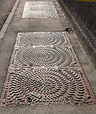 Manhole cover in Fribourg, Switzerland]]