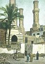 The courtyard of al-Salih Talai's mosque with the minaret surmounting the entrance to the left. The minaret was removed in 1923. In the background the truncated twin minarets of al-Muayyad Shaykh's mosque surmounting Bab Zuwayla can be seen before restoration.