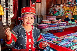 Karen tribal woman in traditional clothes by Varvara Kless-Kaminskaia