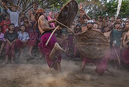 Peresean, a traditional sport conducted by the Sasak Tribe people in the province of West Southeast Nusa, Indonesia by RaiyaniM