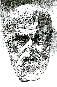 Sculpture représentant la tête d'un vieil homme barbu
