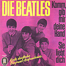 Обложка сингла The Beatles «Komm, gib mir deine Hand / Sie liebt dich» (1964)