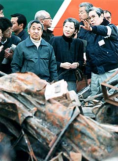 Emperor Akihito and Empress Michiko console sufferers of Great Hanshin-Awaji Earthquake.(1995)