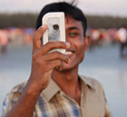 A man uses his mobile phone in Bangladesh 