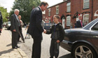 David Cameron shakes hands with 12-year-old Tyler Rushworth in Ashton-under-Lyne, on 10 August 2010.