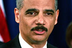 Holder, who announced the indictments.