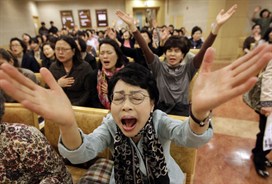 Koreans pray against Lady Gaga