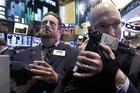 Wall Street climbs to fresh highs overnight