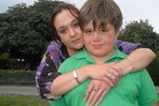 Sharlee Hume and son Raybane, 11, who is recovering after trying to strangle himself at school in the wake of persistent bullying over his eczema and size. Photo / Nathan Crombie