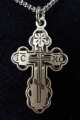 Sterling silver cross on an 18 inch stainless chain