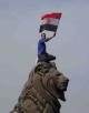 The_lion_of_Egyptian_revolution_Qasr_al-Nil_Bridge-805x1024.jpg